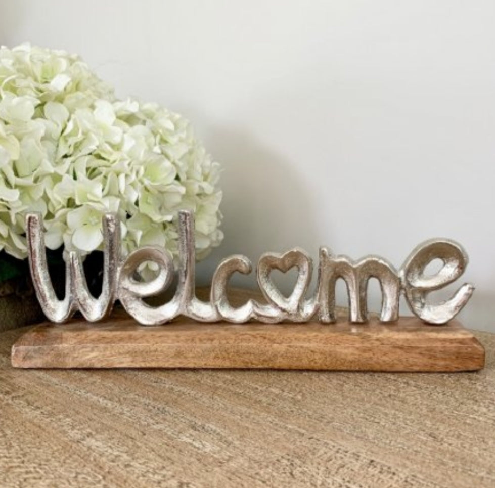 Silver Welcome Sign