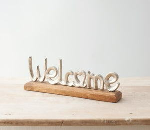 Silver Welcome Sign